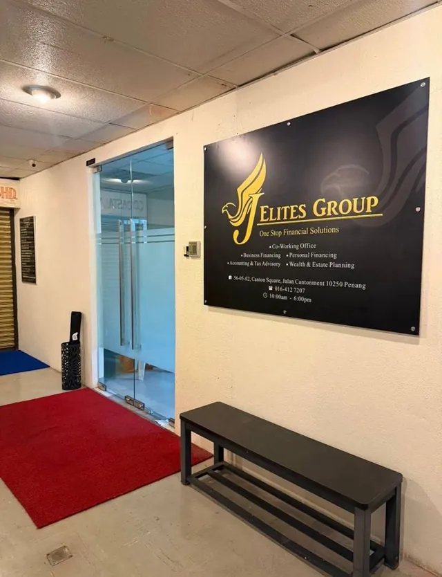 The J Elites Group sign beside our office entrance