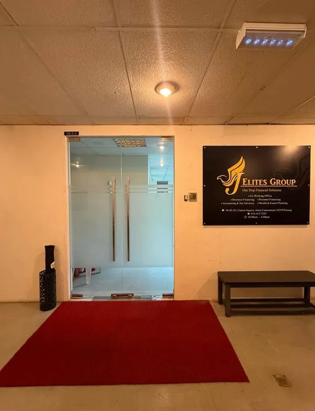 The glass doors of the J Elites Group office, unit 56-05-02
